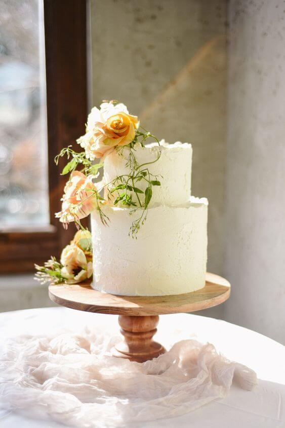 A wedding cake decorated with dried flowers from Hidden Botanics.