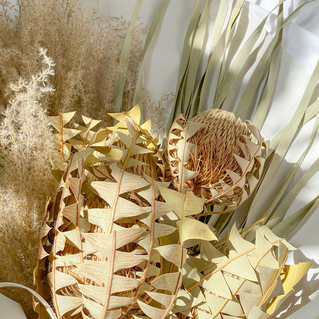 hiddenbotanicsweddings Centerpieces Wild Banksia and Big Palm Leaf Woodland Centerpiece / Centerpiece Design